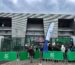 Entrée du Stade Geoffroy-Guichard à Saint-Étienne lors d'un forum emploi – stand Business Club ASSE et bannière France Travail, Tribune Pierre Faurand
